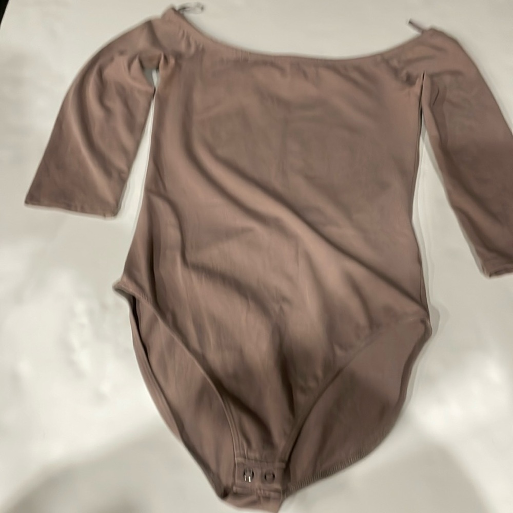 Express woman’s body suit size S/P.